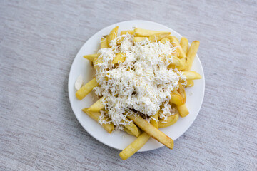 Delicious bulgarian food fries with cheese