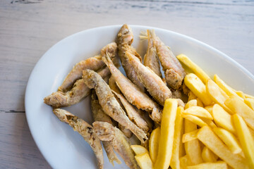 Delicious bulgarian fried fish with fries