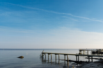 Small wooden pier on the cost of Denmark