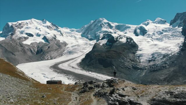 Aerial view of Swiss glacier in the alps, shot by drone in Switzerland, Riffelsee, Matterhorn, Zermatt