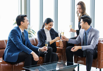 Group of Asian happy cheerful professional successful businessmen and businesswomen in formal suit...