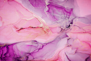 Abstract liquid ink painting background in pink colors.