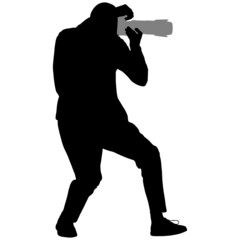 Black silhouette of man with camera in his hands
