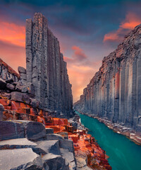 Awesome summer sunrise on Studlagil Canyon. Amazing morning landscape of Jokulsa A Bru river....