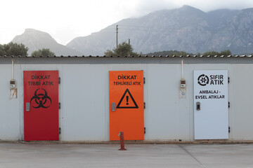 Datca, Turkey - 02.23.2022 : Red, orange and white door. There is 