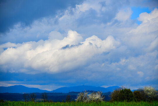Cloudy sky over Jura Mountains in Spring, Mohlin, Rheinfelden, Aargau, Switzerland