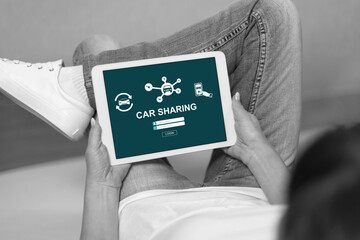 Car sharing concept on a tablet