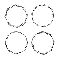 Set of 4 hand drawn spring wreaths isolated on white background, vector. Outline frames of leaves. Doodle style.Collection of floral monogram frames.