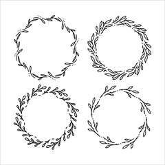 Set of 4 hand drawn spring wreaths isolated on white background, vector. Outline frames of leaves. Doodle style.Collection of floral monogram frames.