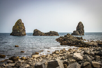 rocks on the beach, lava rocks, cyclops coast, aci trezza, sicily, italy, europe, catania