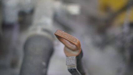Engine oil, oil change dipstick puller with engine oil and car oil change. Trans fluid. 