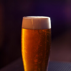 full glass of craft beer close up square