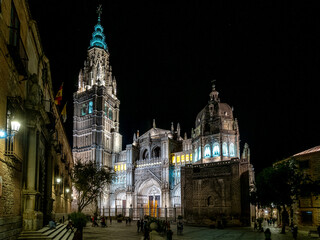 The illuminated Primate Cathedral of Saint Mary in Toledo at night, Spain