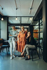Fototapeta na wymiar Diverse businesswomen looking at the camera in an office