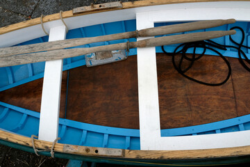 Detail of a rowing boat at the coast of Capri, Italy