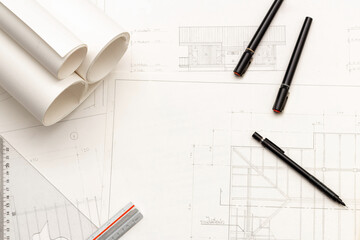 Mockup of architectural concept, Drawing tool and engineer drawing on blueprint with roll blueprint