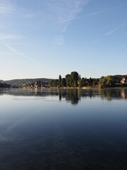 Naklejka premium Desolate Rhine River in STEIN AM RHEIN in SWITZERLAND - vertical