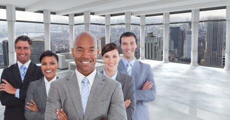 Composite image of portrait of businesspeople smiling against view of cityscape from office window