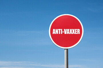 'Anti-vaxxer' sign in round red frame. Blue sky is on background
