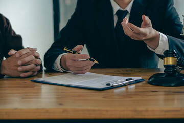 The client is explaining the offense to a lawyer and working together to resolve the offense....