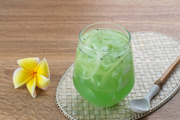 Es Kuwut, traditional Balinese fruit cocktail made from young coconut, melon, nata de coco, basil...