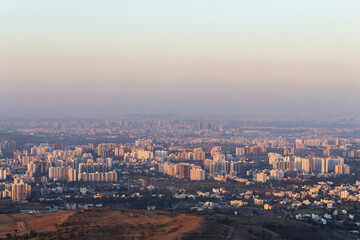 Fototapeta na wymiar Cityscape of Pune city from Bopdev Ghat, Pune, Maharashtra, India
