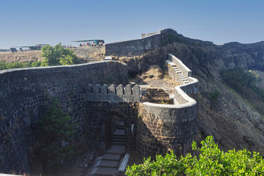 INDIA, MAHARASHTRA, PUNE, December 2021, Tourist at entrance gate of fort from the view tower, Korigad Fort