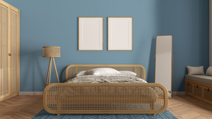 Frame mockup, modern wooden bedroom with rattan furniture in blue tones, double bed with duvet and pillows, carpet, mirror, lamp and decors. Herringbone parquet, interior design idea