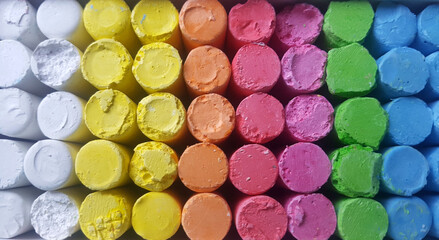 Colored crayons in a box, surface close-up, drawing. Back to the back of the school, kidding.