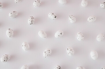 Splattered white eggs on white background.