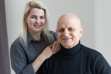 Young pretty woman and her grandfather