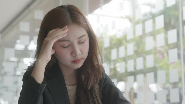thinkful working woman had headaches or using a lot of think. 