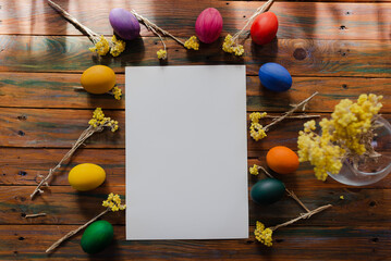 Easter eggs mocap on old wooden background