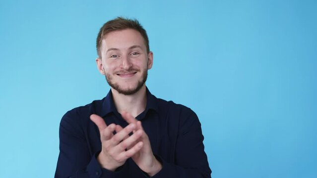 Clapping man. Proud satisfaction. Congratulation gesture. Boomerang animation. Happy friendly smiling guy applauding in joy isolated on blue free space background GIF loop motion.