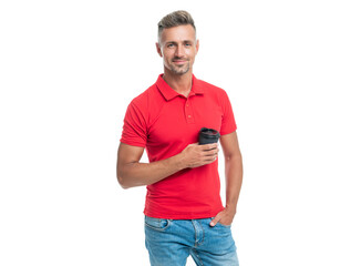 Happy man in casual red tshirt holding disposable cup with takeaway tea isolated on white