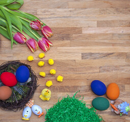 Fototapeta na wymiar Easter eggs and flowers dekoration