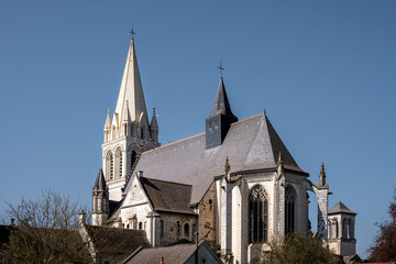 Fototapeta na wymiar Abbey church Saint Pierre Saint Paul in Beaulieu les Loches on a sunny winter afternoon, Touraine, France