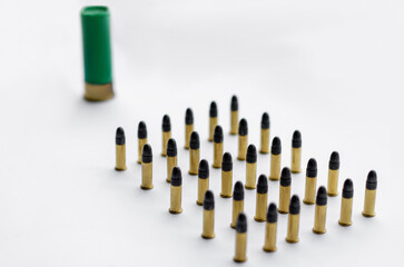 set of bullets on white with blurred background.