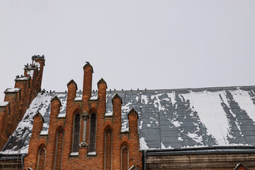 a fragment of the facade of a historic neo-Gothic church