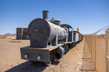 Fototapeta na wymiar Restored railway train and carriages once part of the Hejaz Ottoman Railway network, Al Buwayr Station near Medina, Saudi Arabia