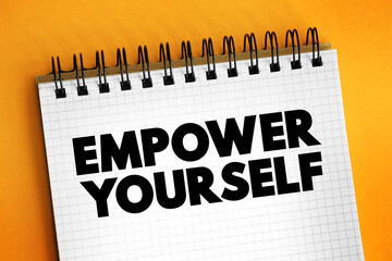 Empower Yourself - making a conscious decision to take charge of your destiny, text concept on...