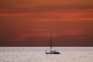 Sailing boat at sea. Sailboat management.