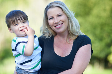 Hes my pride and joy. Portrait of a happy mother holding her baby boy.