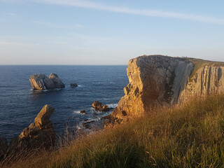 Guys on the top of the cliffs