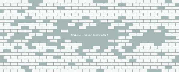 Website is under construction text and brick background.	