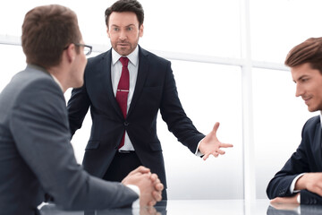 Fototapeta premium businessman talking with employees at a working meeting