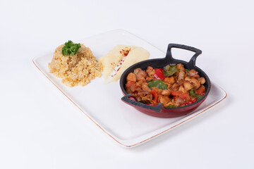 Contrasted view of chicken hair frying pan dish, bulgur pilaf and mashed potatoes on white background in an isolated setting.