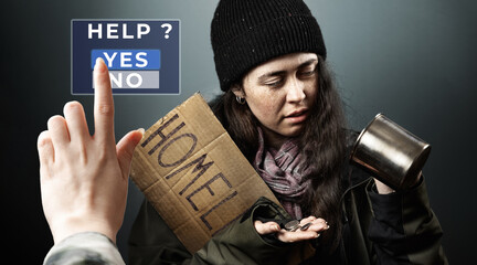A vagabond woman holds a cardboard sign with the inscription homeless and looks at coins from a...