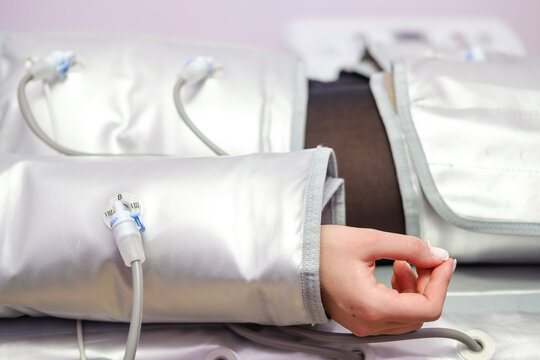 Pressotherapy. Lymphatic drainage massage. Hardware cosmetology. Body care. Anti-cellulite and anti-fat therapy in beauty salon.