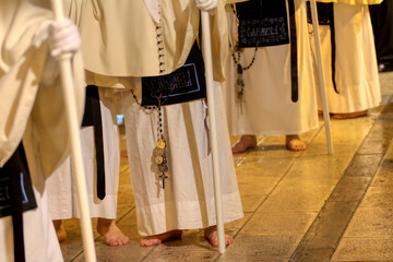 Holy Week Rites - Brothers on a pilgrimage to the main churches during the Procession of Taranto, Puglia, Italy